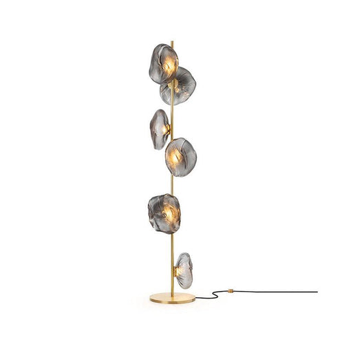 Aether Bloom Floor Lamp with handcrafted smoked glass petal shades arranged along a minimalist black metal frame, creating sculptural ambient lighting for luxury interiors.