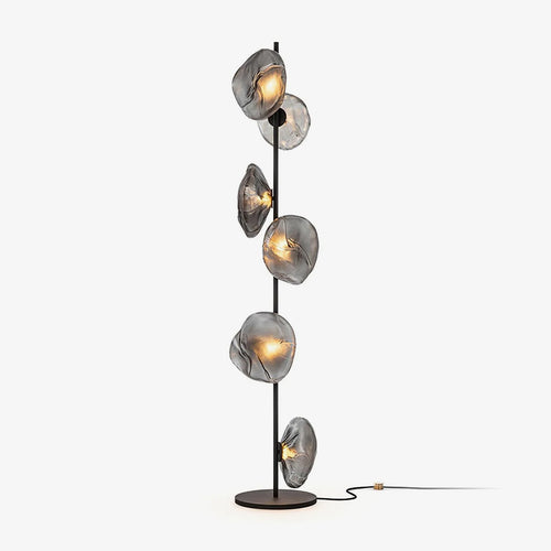 Aether Bloom Floor Lamp with handcrafted smoked glass petal shades arranged along a minimalist black metal frame, creating sculptural ambient lighting for luxury interiors.