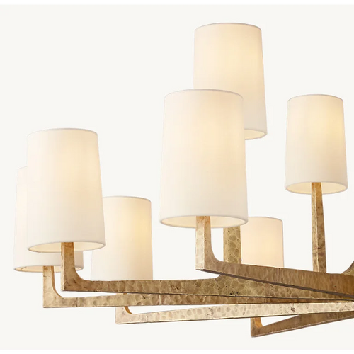 Alden Chandelier featuring a handcrafted brass frame and elegant fabric shades, a luxury statement light designed for dining rooms and sophisticated interiors