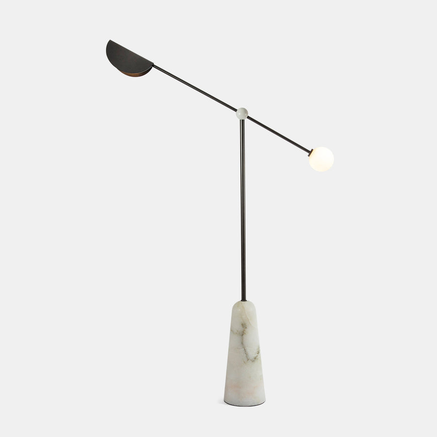 Alonzo Floor Lamp featuring a sculptural brass frame, frosted glass globe, directional metal reflector, and luxurious marble base, designed for contemporary luxury interiors