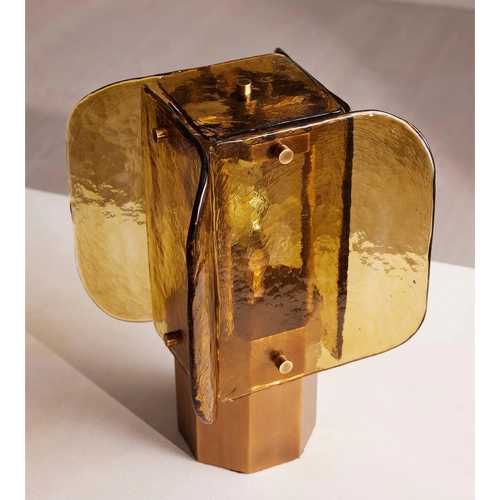 Ambra Table Lamp featuring handcrafted amber glass panels and a sculptural metal base, a luxury Art Deco-inspired lighting piece for sophisticated interiors