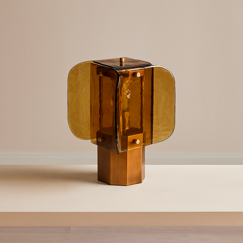 Ambra Table Lamp featuring handcrafted amber glass panels and a sculptural metal base, a luxury Art Deco-inspired lighting piece for sophisticated interiors