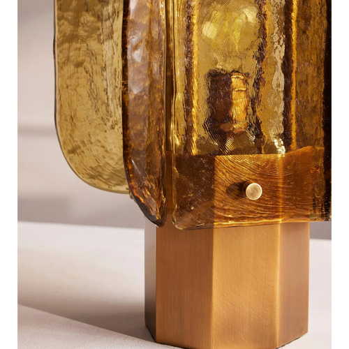 Ambra Table Lamp featuring handcrafted amber glass panels and a sculptural metal base, a luxury Art Deco-inspired lighting piece for sophisticated interiors