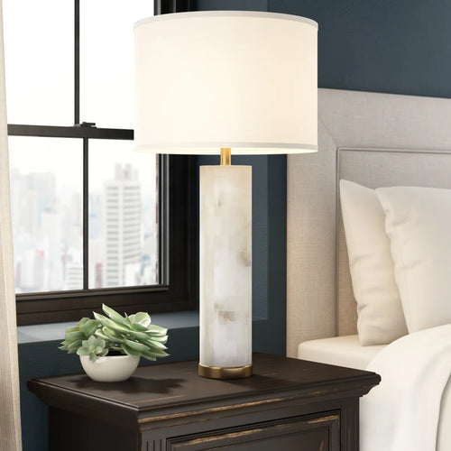 Arden alabaster table lamp with white shade on modern console