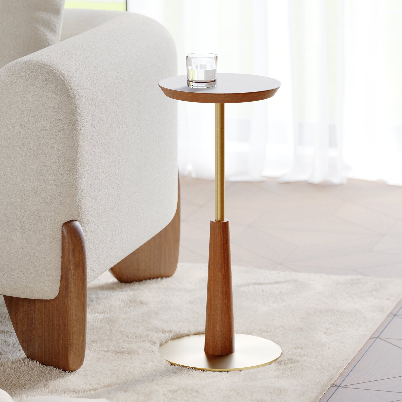 Arden Drink Table with a solid walnut-finished acacia wood top, sculptural wooden pedestal, and brushed gold steel base, designed for modern luxury interiors