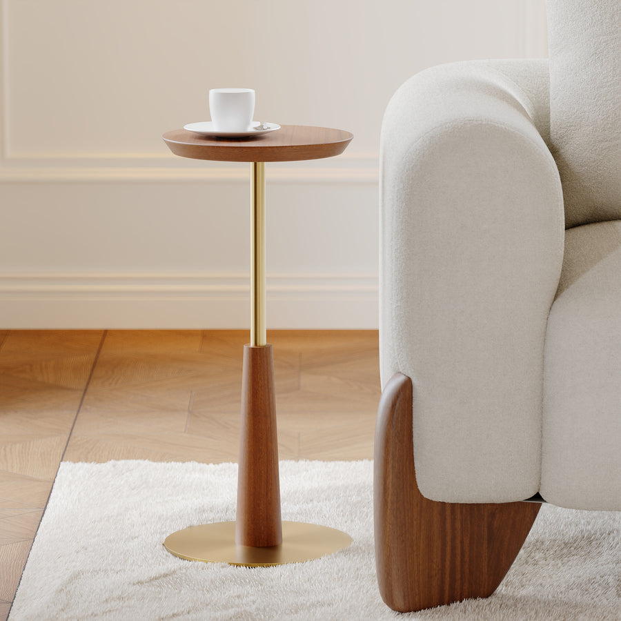 Arden Drink Table with a solid walnut-finished acacia wood top, sculptural wooden pedestal, and brushed gold steel base, designed for modern luxury interiors