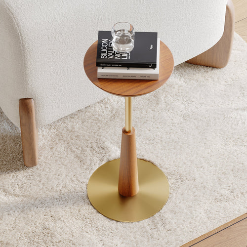 Arden Drink Table with a solid walnut-finished acacia wood top, sculptural wooden pedestal, and brushed gold steel base, designed for modern luxury interiors