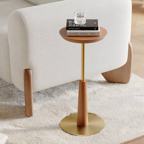 Arden Drink Table with a solid walnut-finished acacia wood top, sculptural wooden pedestal, and brushed gold steel base, designed for modern luxury interiors