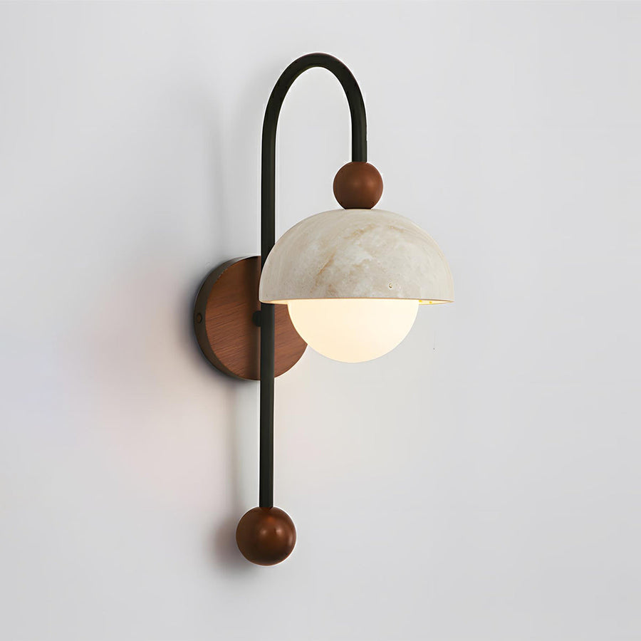 Wall-mounted lamp with marble-like shade and wooden accents on a light gray background