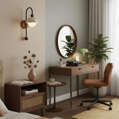 Modern bedroom with wooden desk, chair, and side table.