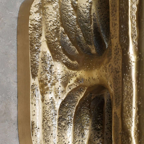 Atelier Sconce crafted from hand-forged brass and natural marble, a luxury wall light featuring sculptural texture and warm ambient illumination
