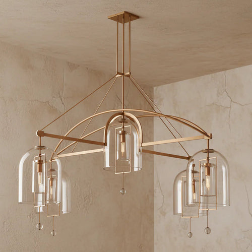 Aurelius Chandelier in brushed brass with clear glass shades, luxury Art Deco pendant light for dining rooms and grand entrances.