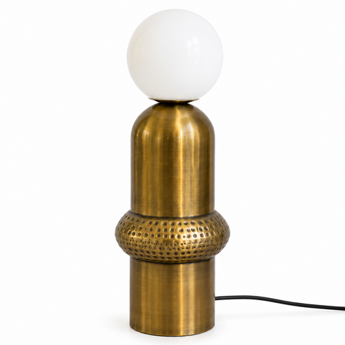 Aureon Table Lamp featuring a brushed brass sculptural base with handcrafted textured detailing and a frosted glass globe, designed for modern luxury interiors.