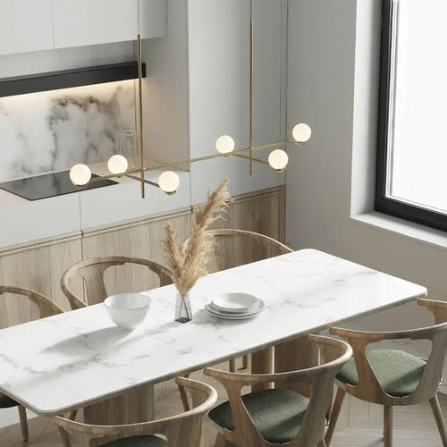 Modern brass linear chandelier with globe lights