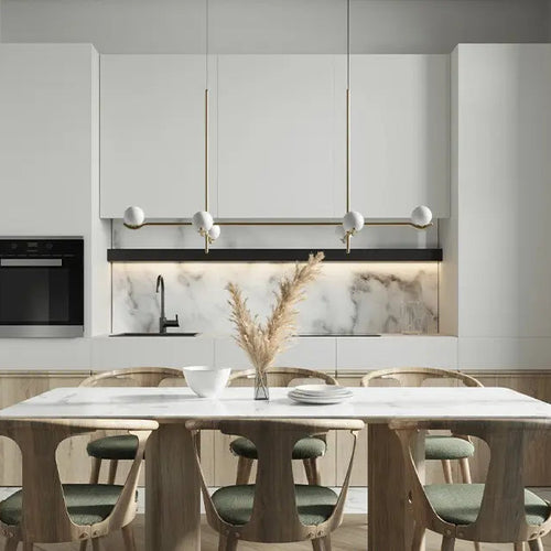 Modern brass linear chandelier with globe lights