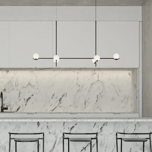 Modern brass linear chandelier with globe lights