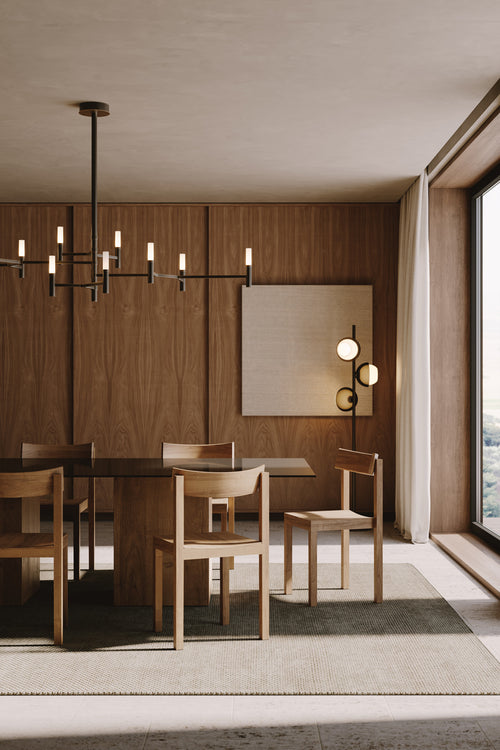 Evo Floor Lamp featuring illuminated frosted glass discs and a sculptural brass frame, designed as a contemporary statement lighting piece for luxury interiors