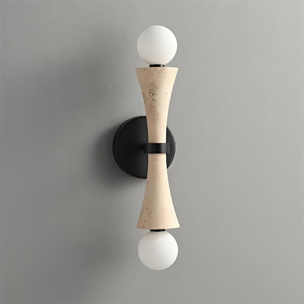 Hecker Travertine Wall Lamp featuring a sculptural natural stone body with dual globe lights and matte black hardware, designed for luxury contemporary interiors.