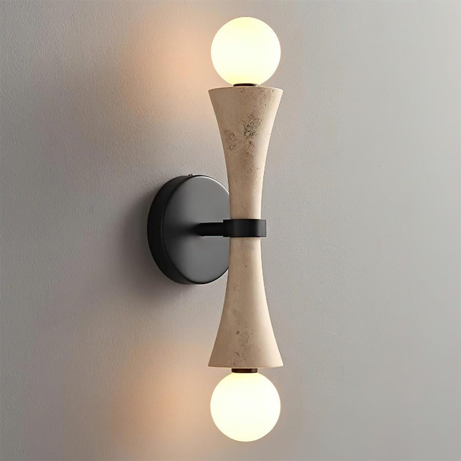 Hecker Travertine Wall Lamp featuring a sculptural natural stone body with dual globe lights and matte black hardware, designed for luxury contemporary interiors.
