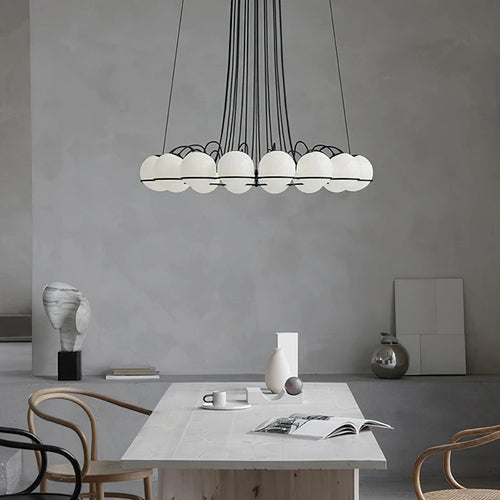 Luxury chandelier with clustered glass orbs hanging from ceiling