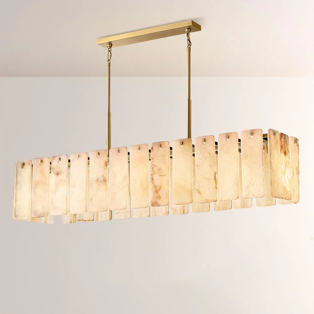 Lunara Linear Chandelier crafted from natural alabaster panels and solid brass, a luxury statement light designed for dining rooms and sophisticated interiors