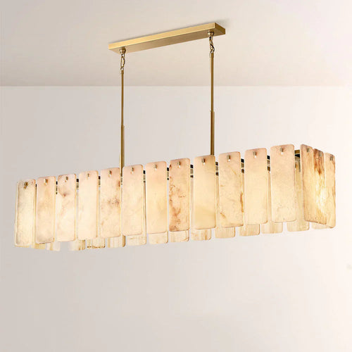 Lunara Linear Chandelier crafted from natural alabaster panels and solid brass, a luxury statement light designed for dining rooms and sophisticated interiors