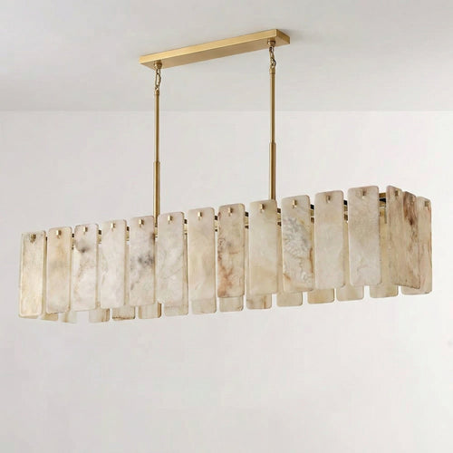 Lunara Linear Chandelier crafted from natural alabaster panels and solid brass, a luxury statement light designed for dining rooms and sophisticated interiors