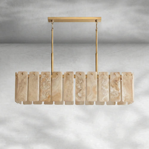 Lunara Linear Chandelier crafted from natural alabaster panels and solid brass, a luxury statement light designed for dining rooms and sophisticated interiors