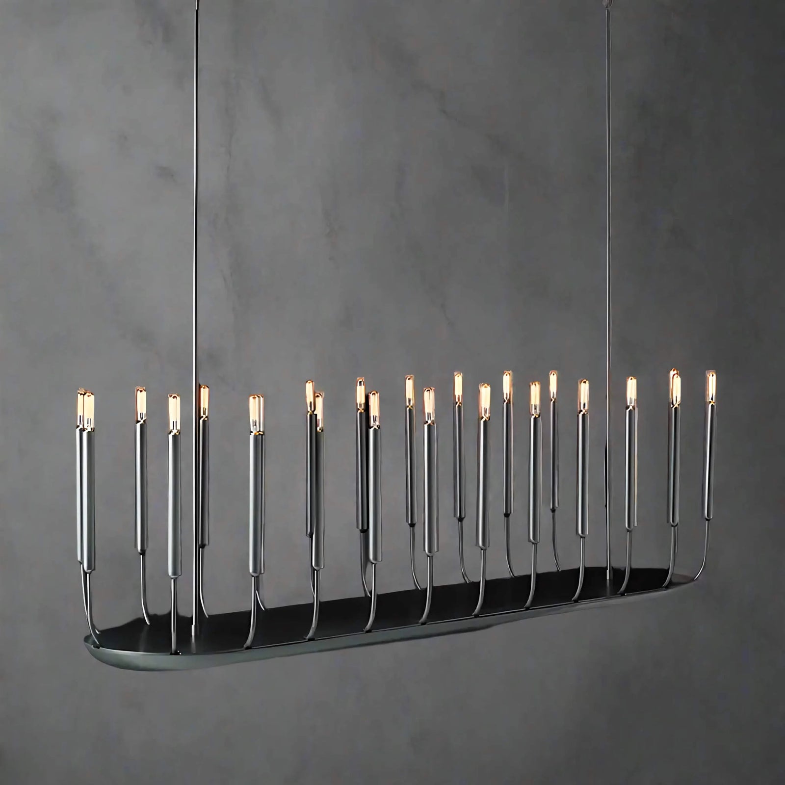 Noir Atelier Chandelier featuring slender candle-inspired LED lights on a minimalist black metal frame, designed for modern dining rooms and architectural interiors