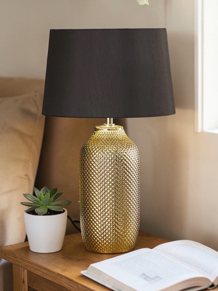 Designer table lamp with patterned ceramic body