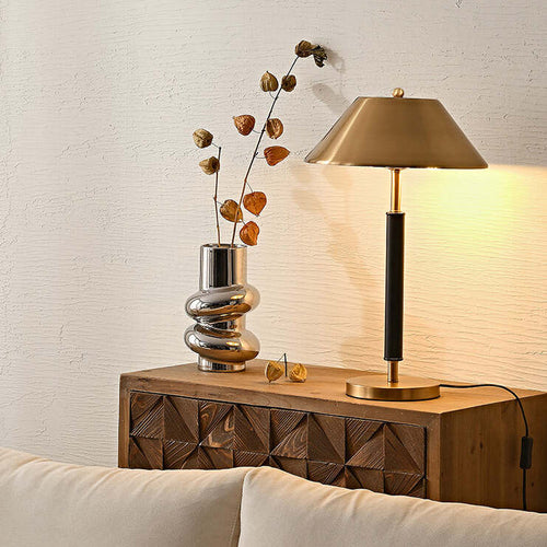 close up brass metal shade table lamp gold finish