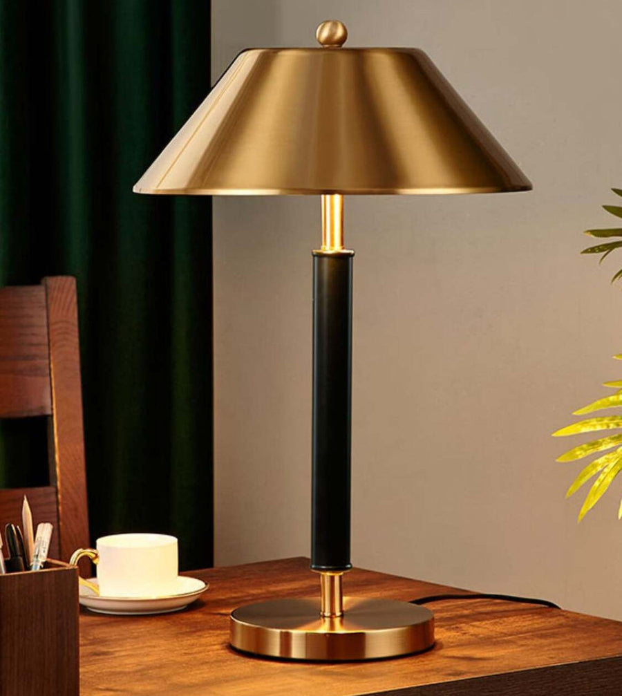 close up brass metal shade table lamp gold finish