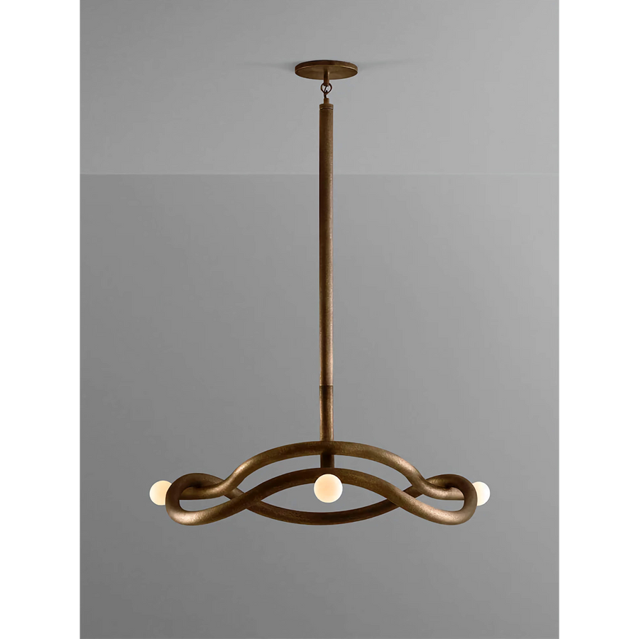 Seraphina Chandelier featuring a sculptural intertwined bronze frame with glass accents, a luxury Mid-Century modern statement light for sophisticated interiors