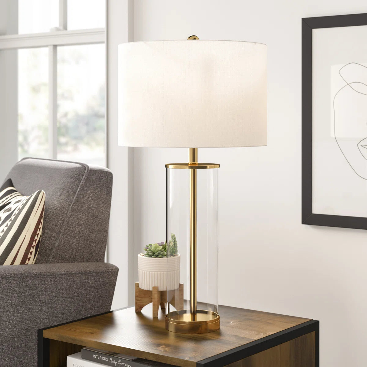 glass column table lamp with gold base and white shade