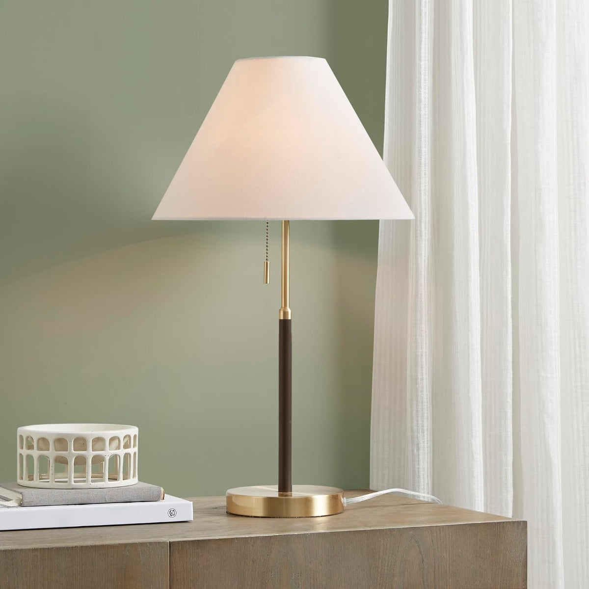 Vela gold and black table lamp with white fabric shade