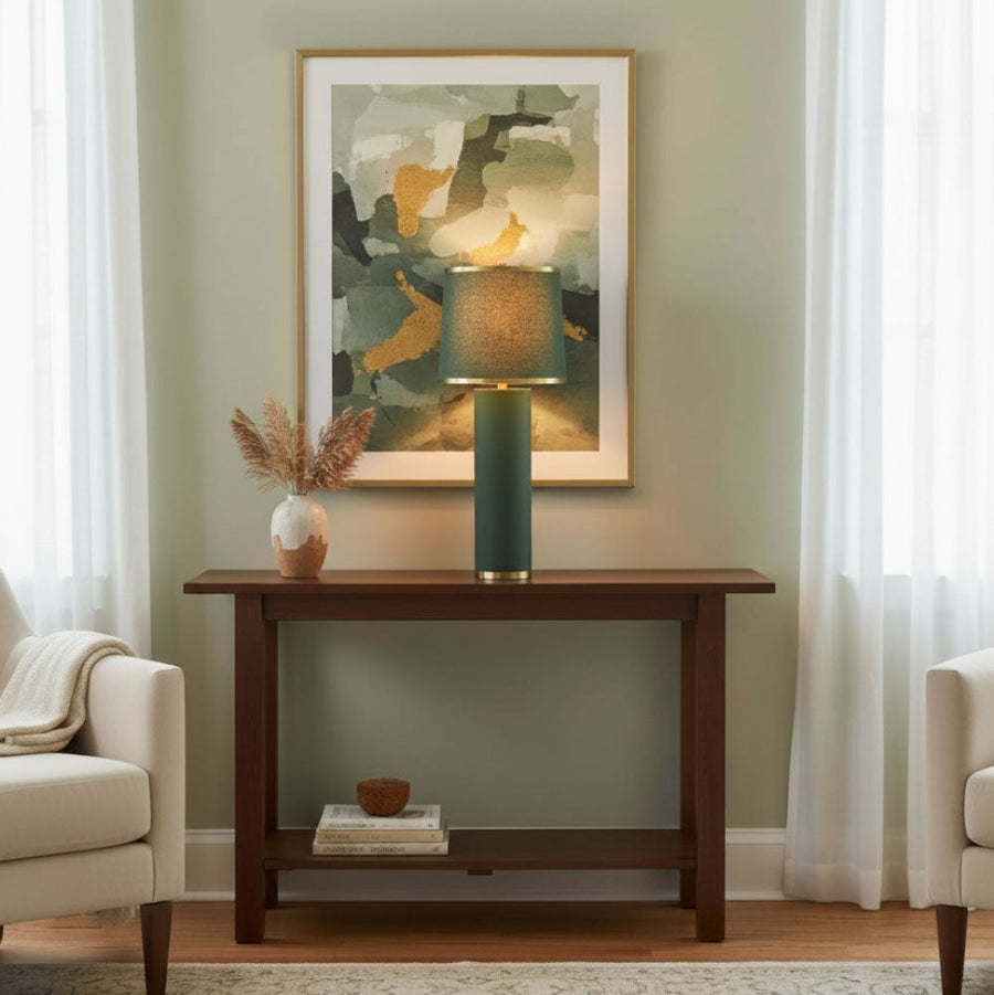 Living room with a wooden console table, Green and gold modern table lamp with cylindrical base