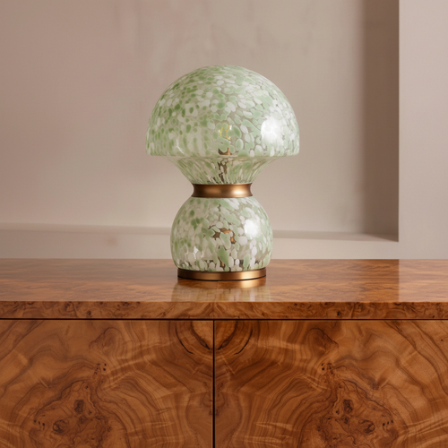 Verde Murano Table Lamp featuring hand-blown green and ivory speckled glass with elegant copper accents, a luxury statement lamp inspired by Murano craftsmanship