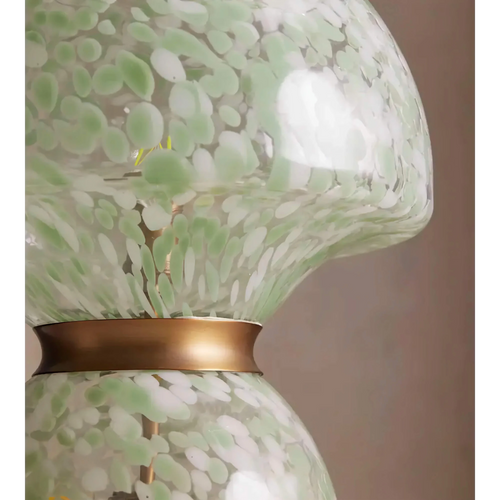 Verde Murano Table Lamp featuring hand-blown green and ivory speckled glass with elegant copper accents, a luxury statement lamp inspired by Murano craftsmanship