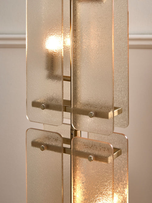 Vesper Floor Lamp featuring stacked textured glass panels and antique brass detailing, a luxury statement floor light for contemporary interiors