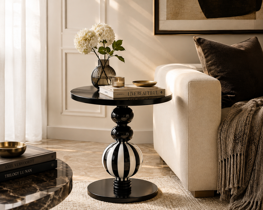 Bellagio black and white striped pedestal side table in a modern living room