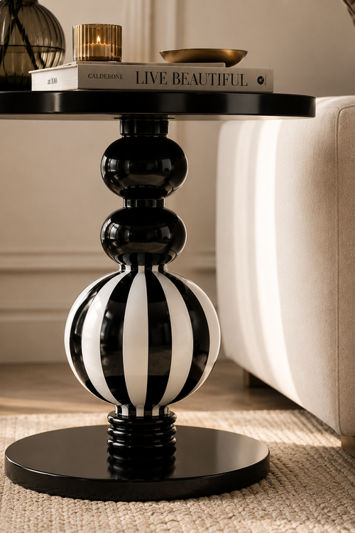 Bellagio black and white striped pedestal side table in a modern living room